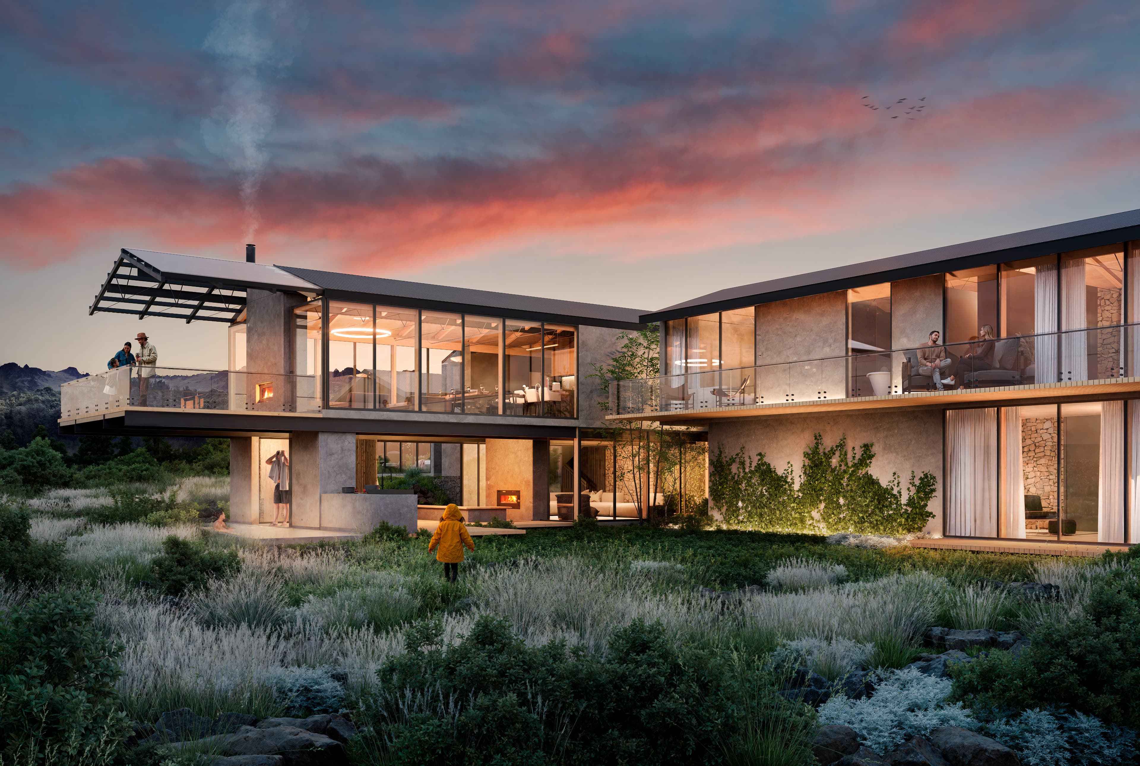 Casa unifamiliar contemporánea rodeada de bosque nublado.